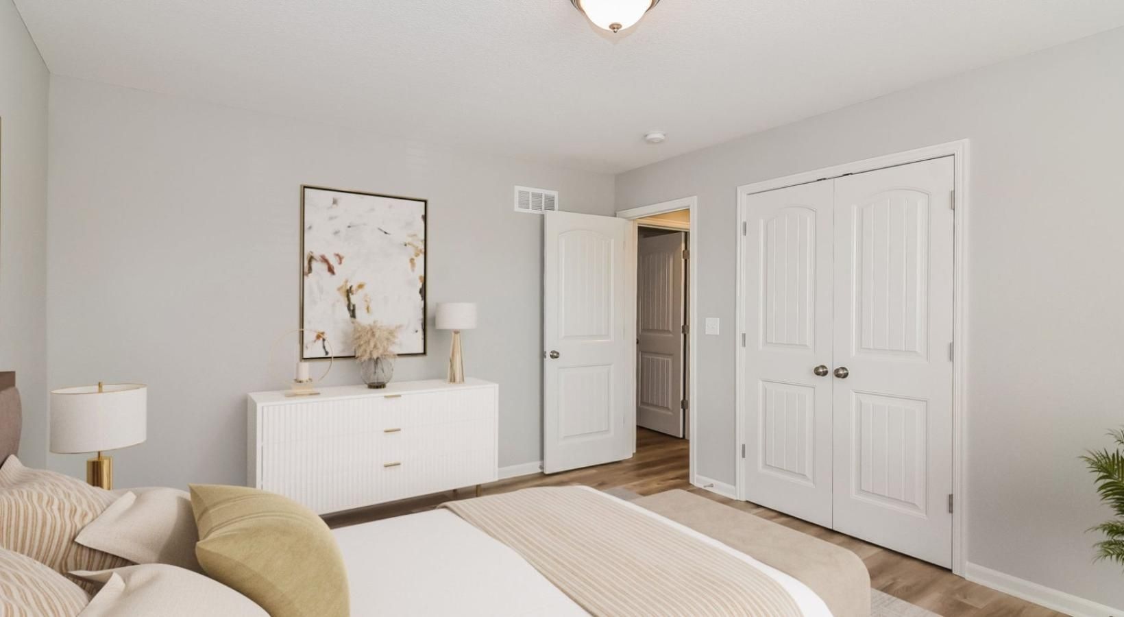 Generous bedroom offerings to fit every family a room with a bed and a couch