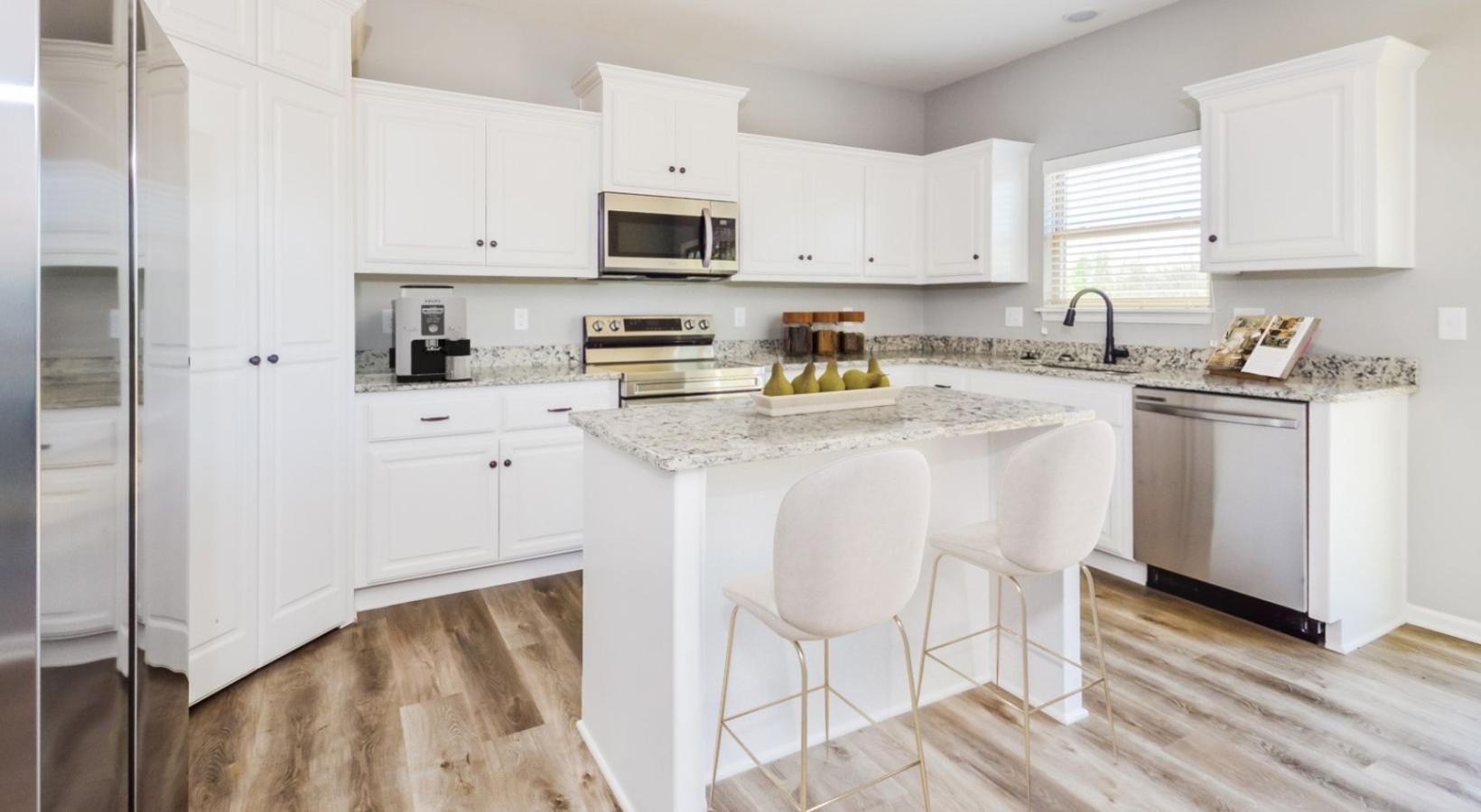 Beautiful kitchens with designer finishes a kitchen with white cabinets