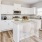 a kitchen with white cabinets