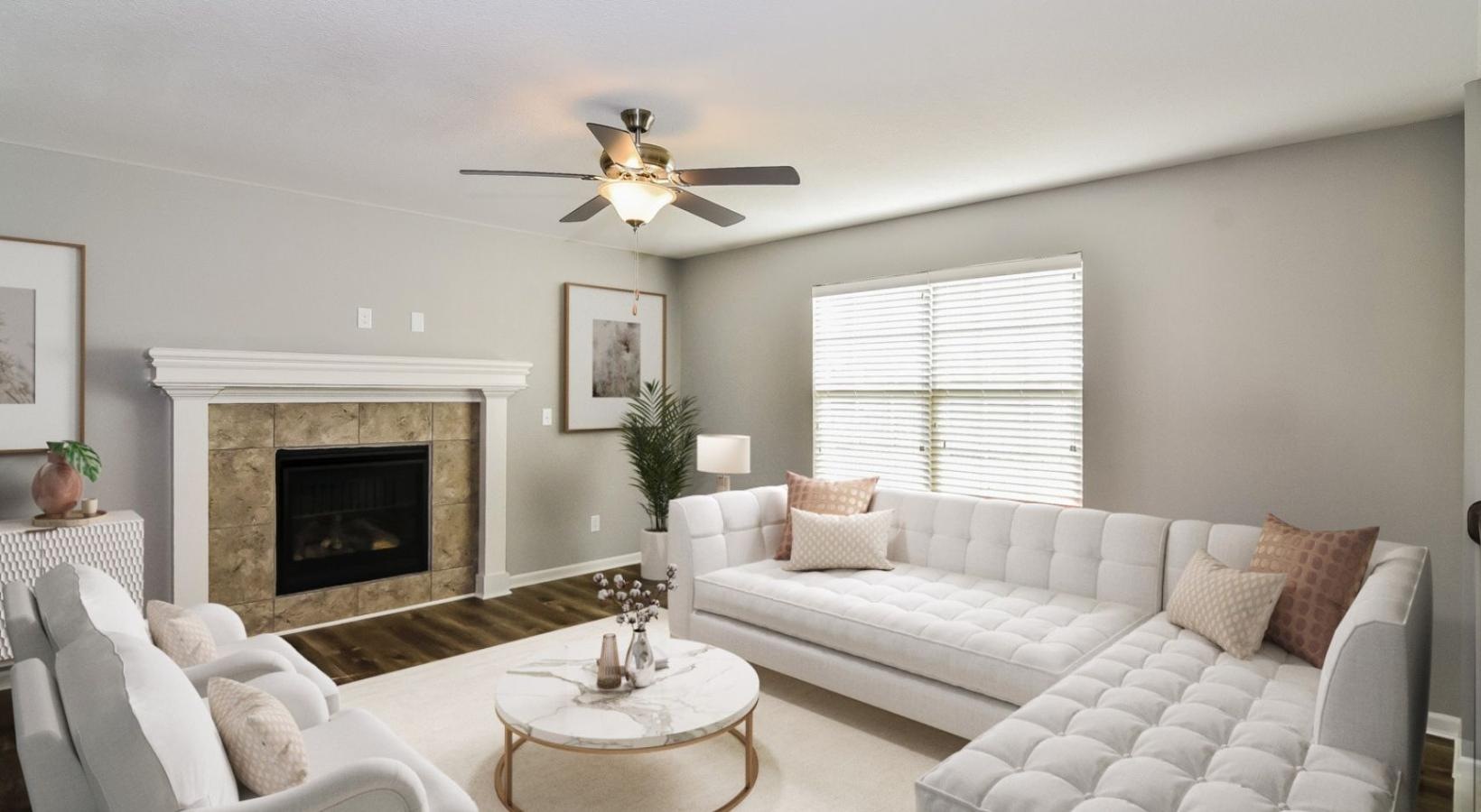 Spacious living areas to recline and recharge a living room with a fireplace