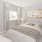 a bedroom with a bed and a lamp