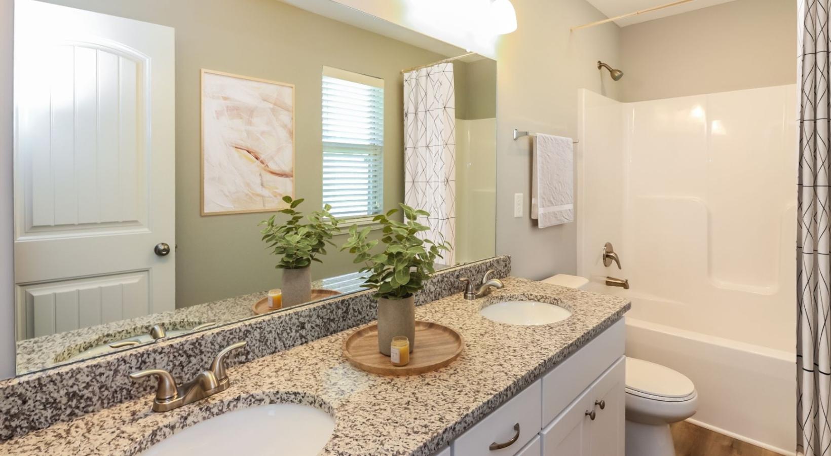 Spacious bathrooms with everything you need a bathroom with a marble countertop