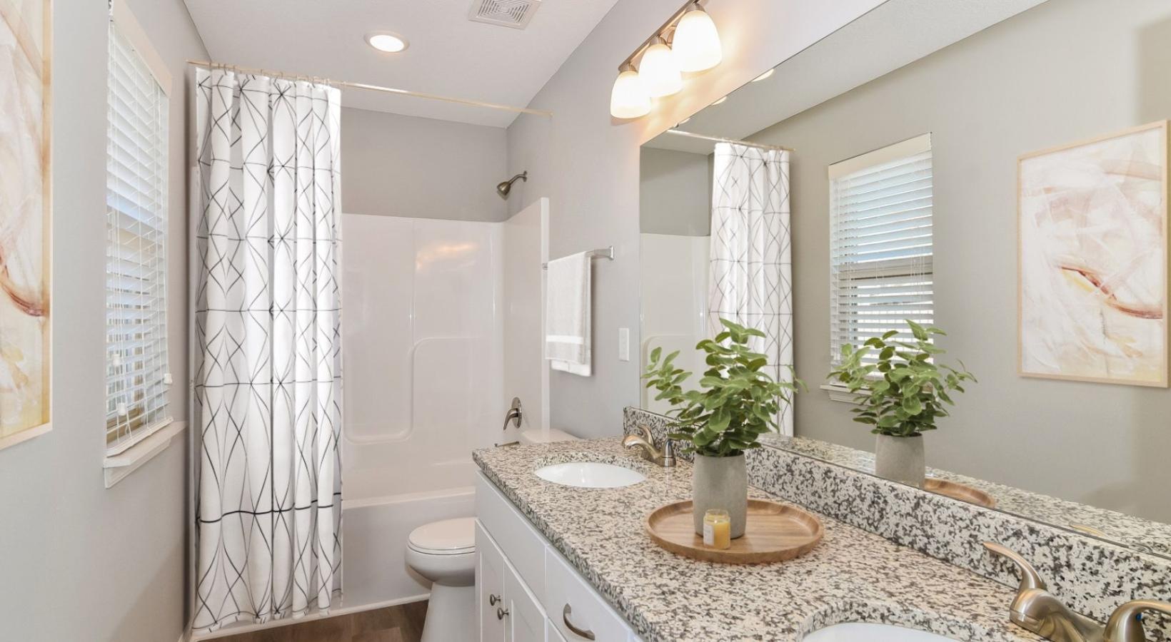 Spacious bathrooms with everything you need a bathroom with a marble countertop