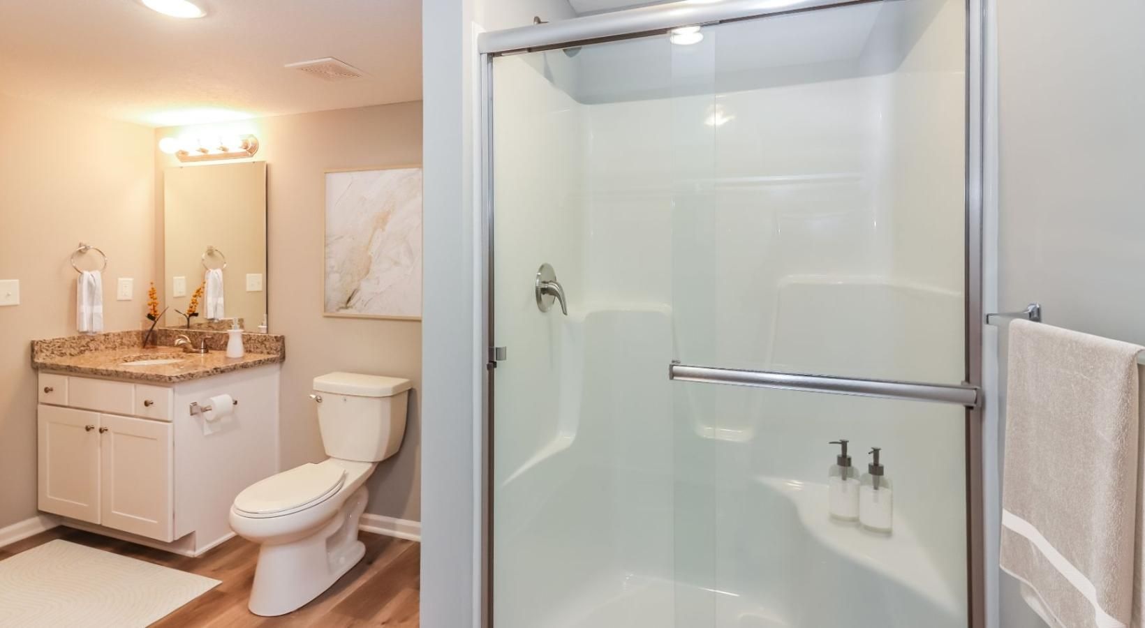 Bathroom options with thoughtful details a bathroom with a shower unit and toilet